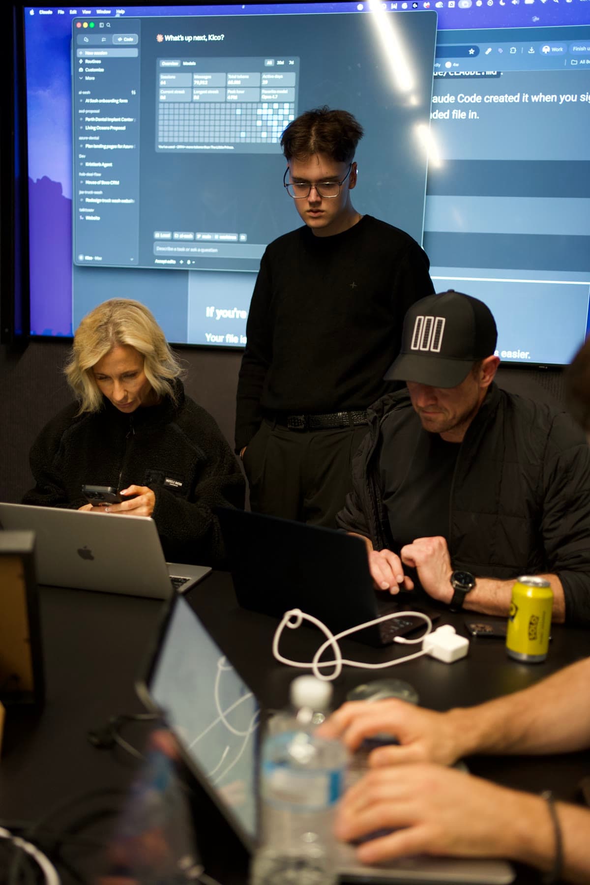 Working through a build with an attendee at their laptop